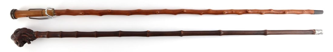 ANTIQUE WALKING STICK CANE LOT LION HEAD & SYSTEM: Very nice lion head with glass eyes and silver ferrule tip, measures 36 1/2 inch, the second 37 inch with good ferrule tip, measures 37 inches.