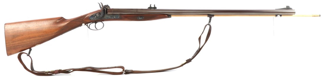 KODIAK PERCUSSION DOUBLE BARREL RIFLE 50 CAL: 28 1/2 inch barrel, 16 1/2 inch wood stock. Very good bore. Some intermittent pitting on barrel. Action functions as intended. Half and full cocks. Non-FFL. No international shipping. Caliber: 50 Seri