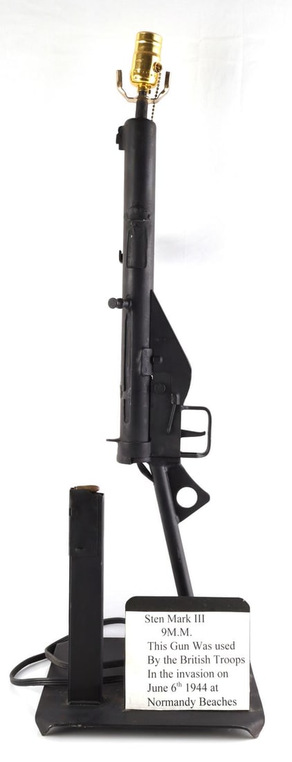 WWII NORMANDY LANDING STEN GUN LAMP TRENCH ART: With sign, stating this was used by the British troops at Normandy Beaches, doesn't distinguish, gun like this, or this gun, open to interpretation. With that said it is a genuine Sten MK III totally 