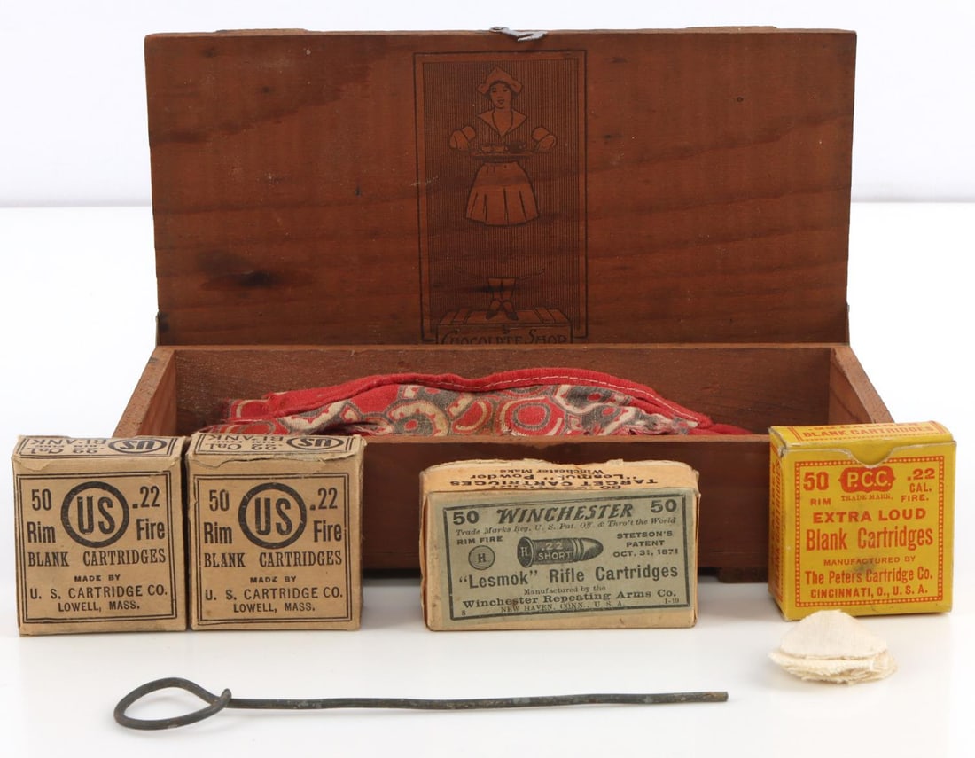 ANTIQUE AMMUNITION WINCHESTER LESMOKE CARTRIDGES: All contained in antique Chocolate box, Winchester box is very good and contains 31 rounds, balance are partially filled Blank boxes.