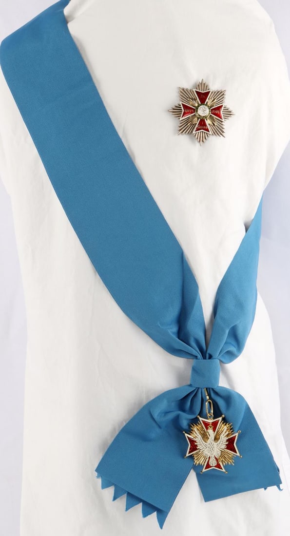 POLISH ORDER OF THE WHITE EAGLE CROSS W RIBBON: A Polish "Order of the White Eagle" star, cross, and ribbon. Cross and star are approximately 3 inches and the ribbon has a length of 34 inches. Lot is in good condition.