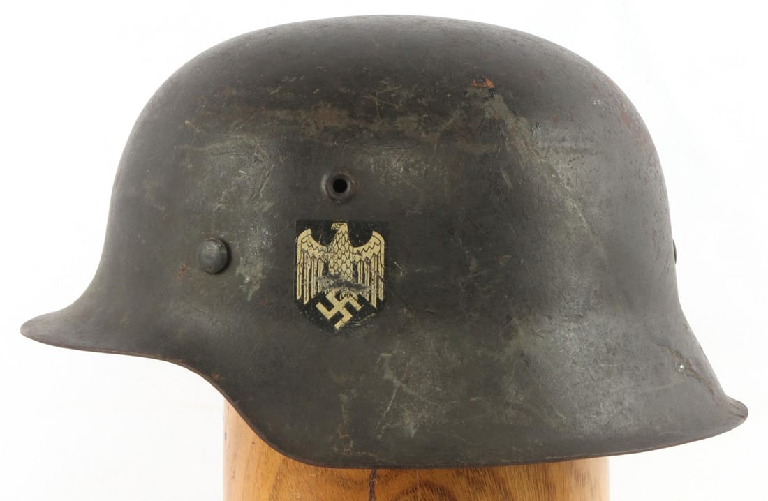 WWII GERMAN THIRD REICH HEER M42 HELMET: Has original liner, maker stamped at crown, 1708 stamped rear, ET 64 over left ear, scratches externally, has Heer decal.