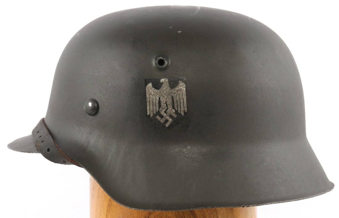 WWII GERMAN REICH M42 FREE INDIAN LEGION HELMET: Original M-42 helmet, rear stamped HKP66 over 522, good chinstrap and 8 finger liner, Indian decal is believed added, but remains a nice example, sold as is.