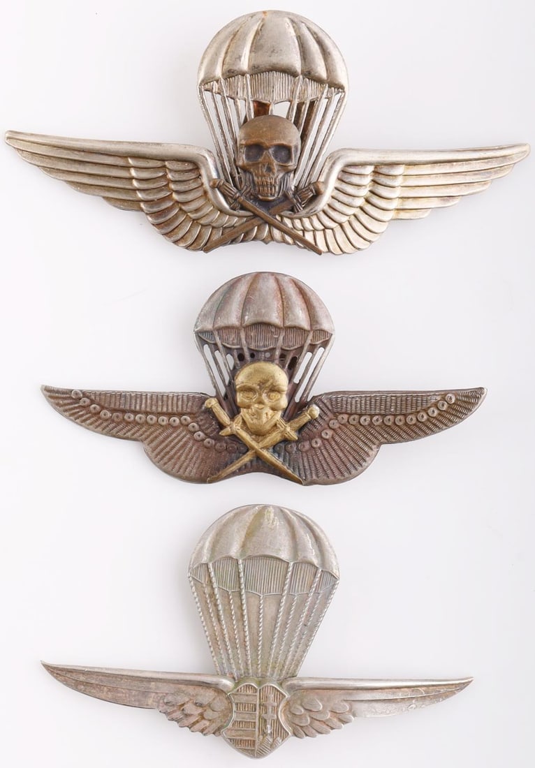 3 WWII GERMAN HUNGARIAN PARATROOPER BADGES: Lot of 3 WWII paratrooper badges. Badge with the bronze totenkopf marked 845. Very good condition. Measure 3 - 3 3/4 inches. This lot has a reserve.