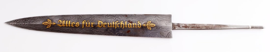 WWII GERMAN THIRD REICH SA HONOR DAGGER: Damascus blade with SA motto in gold leaf. Reverse with Ernst Rohm inscription and Eickhorn maker's mark. Measures 13 3/8 inches. Very good condition. Post war example. This lot has a reserve.