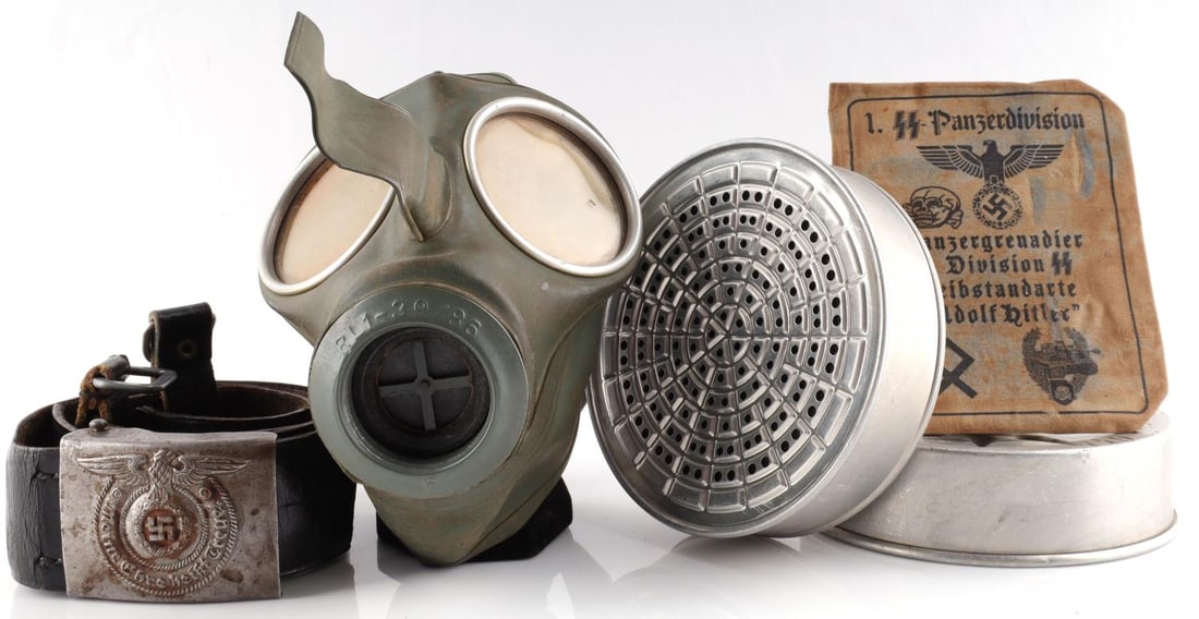 6 WWII GERMAN REICH GAS MASK & PANZER DIVISION ID: Lot of six (6) WWII German Reich gear items including a gas mask with two air filters(filters are mark with the Waffenamt proof), a leather belt with an SS Enlisted men buckle(marked RODO), and lastly