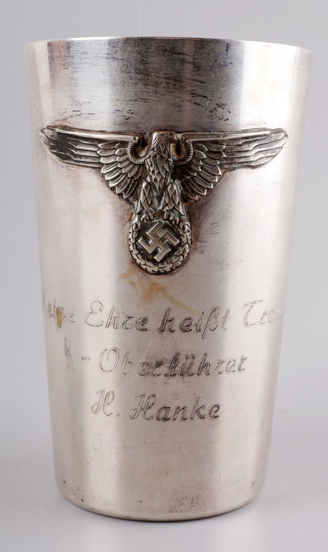 WWII GERMAN THIRD REICH SS EAGLE SILVER GOBLET: WWII German Third Reich silver goblet with SS eagle and an inscription of: "My Honor Is Loyalty." Oberf?hrer H Hanke. Dimension: 4.25 inches tall. 3inches wide. In very good condition. Unauthenticated