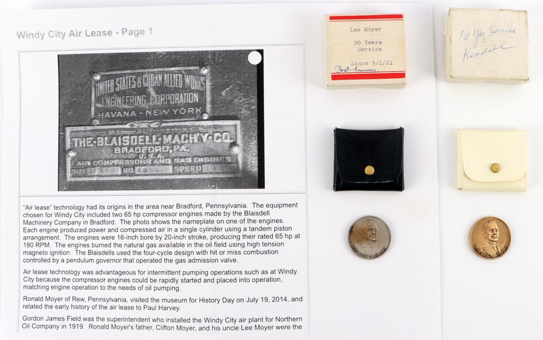 LEE MOYER POSTHUMUS SERVICE AWARD KENDALL REFINERY: 2 Service Medals issued by the Kendall Refinery company to Lee Moyer 1 for 16 Years service the second for 20 Years issued Posthumously. Lee Meyer while working with his brother was killed on Windy Ci