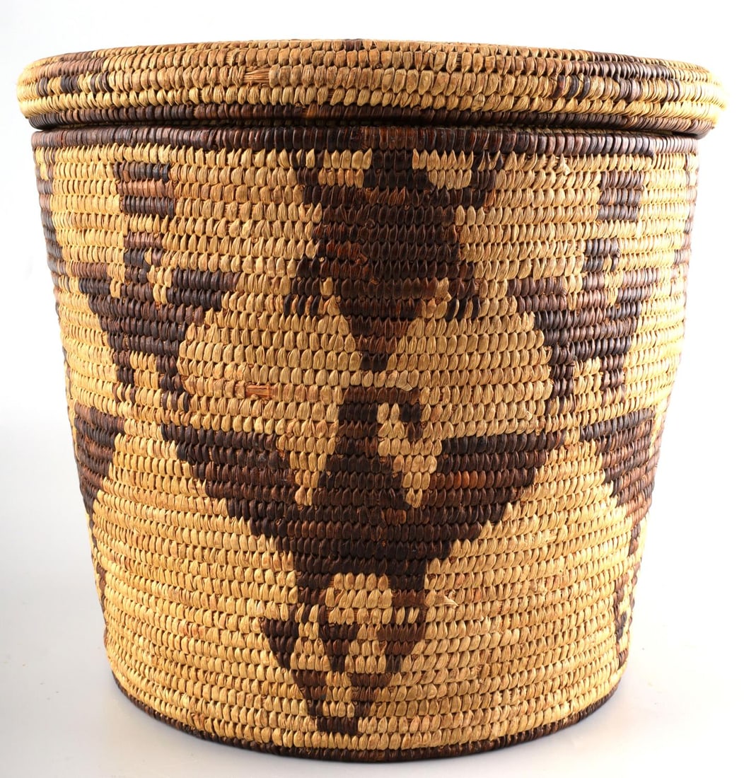 PIMA PAPAGO INDIAN POLYCHROME LIDDED BASKET: Southwestern Native American coiled zoomorphic polychrome lidded basket with age patination and light wear to the outside edge of the lid. Lid fits well with some resistance. Height 9 inches with lid,