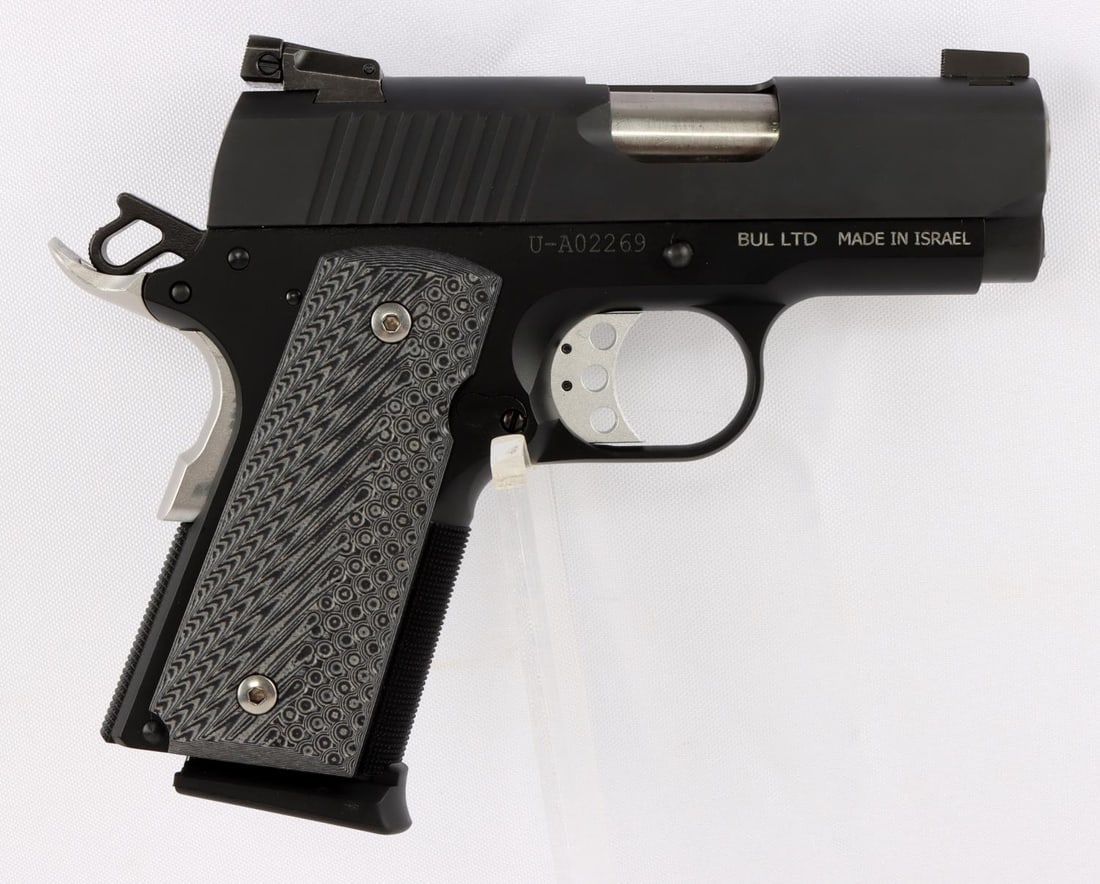 MAGNUM RESEARCH 1911 .45 ACP SEMI AUTO PISTOL NIB: New in box including a soft carrying sleeve, lock, owner's manual, and a dagger with sheath. FFL required for transfer. No international shipping. Know your state laws before bidding. Caliber: .45ACP 