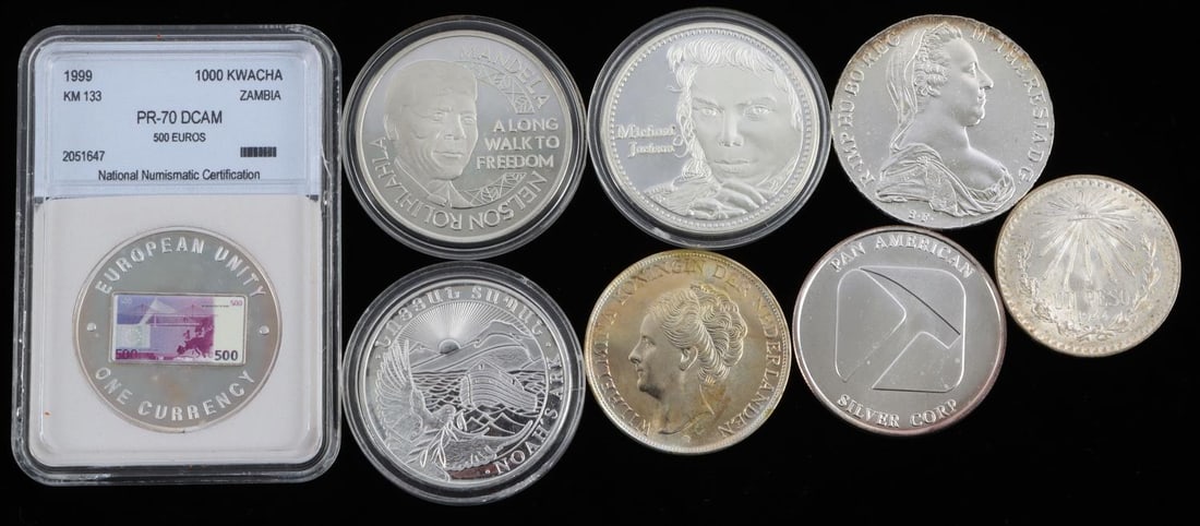 8 WORLD SILVER COIN LOT ZAMBIA ARMENIA ROBBEN ETC: Also Michael Jackson, Northwest Territorial Mines, Proof 70 DCAM NNC graded 1000 Kwacha, Netherlands, Mexico, Robben Island , and others.