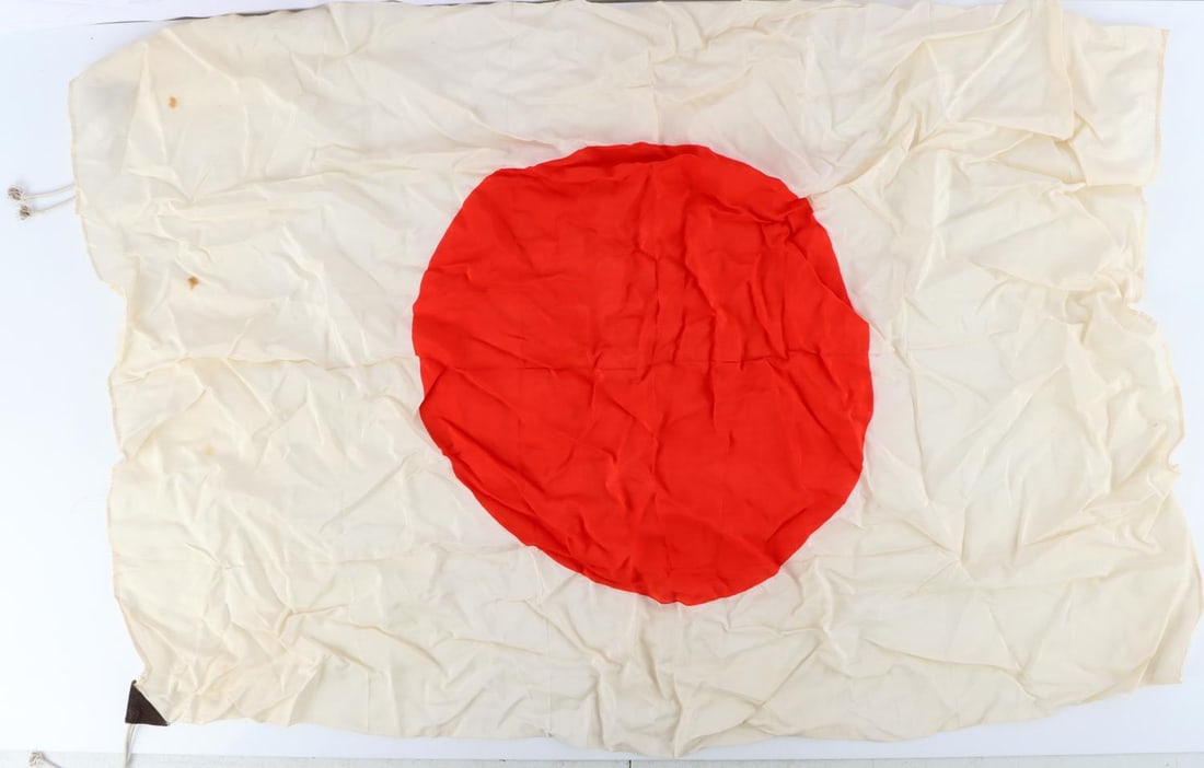 WWII JAPANESE MEATBALL CAPTURED BATTLE FLAG: Measures 39 X 29 inches, very good original condition, some rust stains near hoist, leather hoist reinforces.