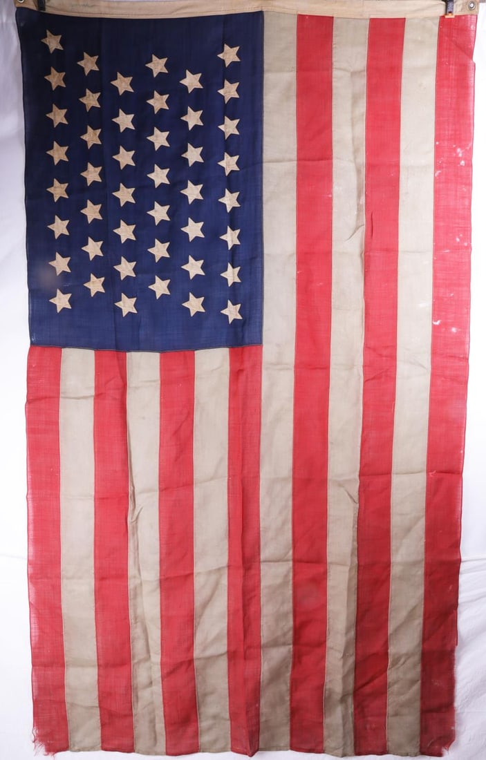 44 STAR CIVIL WAR VETERAN CASKET FLAG NAMED HOIST: Flag is cotton and measures 80 X 48 inches, on hoist veterans name G.W. Jones, some age wear as expected good overall.