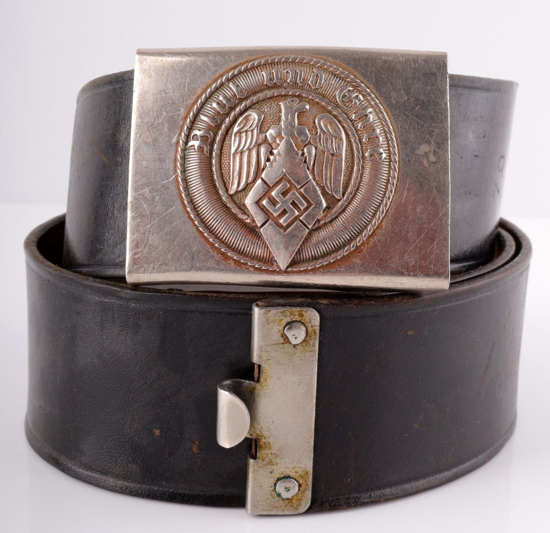 WWII GERMAN THIRD REICH HITLER YOUTH BELT BUCKLE: Hitlerjugend steel belt buckle. Marked RZM and 72. Part of the code has worn way. It measures 2 3/8 inches. 70 stamped on belt for size.