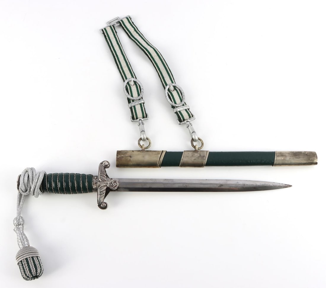 WWII GERMAN THIRD REICH KRIERGSMARINE DAGGER: WWII German Kriegsmarine dagger and hangers. Eickhorn-Solingen stamped on the blade. Dimension: 16 total inches, blade 10 inches. In very good condition. Unauthenticated and sold as is. This lot has a