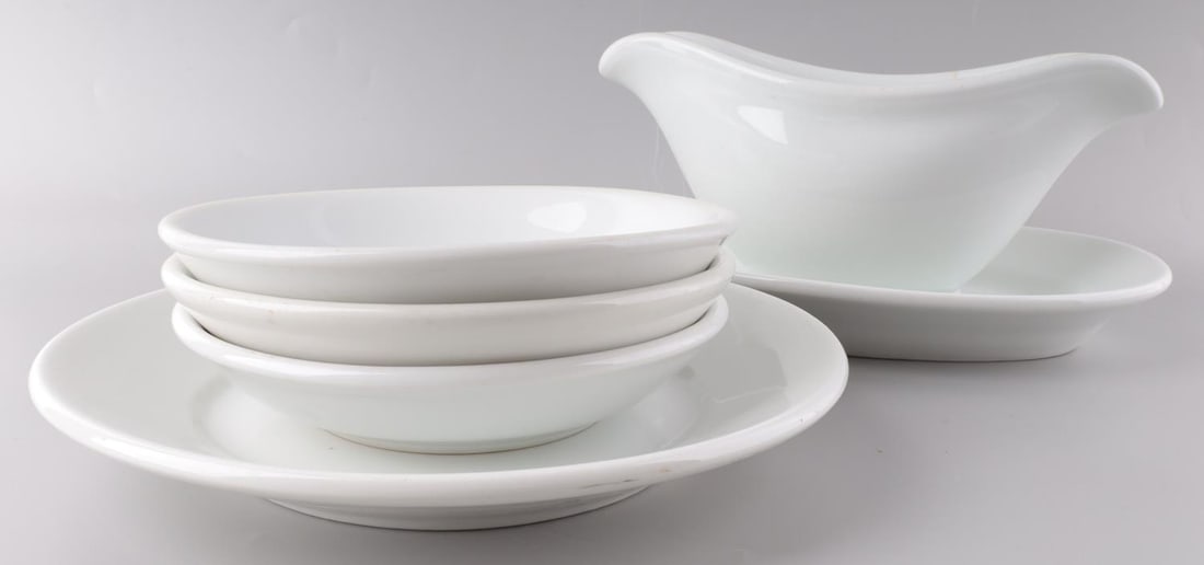 5 WWII GERMAN REICH HEER NSDAP PORCELAIN PLATE LOT: Lot of five (5) WWII German Reich Heer Army/NSDAP Porcelain dinnerware items including four plates and one gravy boat / bowl. Plate sizes range between 6 1/2 inches to 9 inches. Each plates underside 