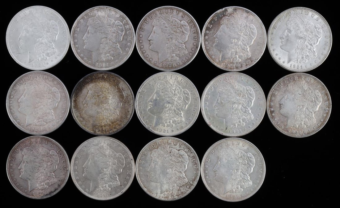 1921 MORGAN SILVER DOLLAR COIN LOT OF 14: 14 Morgan dollars, 90% silver constitutional coins all date D 1921. Ungraded in approx. EF to AU Choice condition. This lot has a reserve.