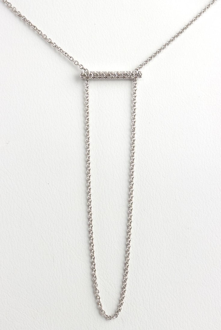 14K WHITE GOLD DIAMOND ADJUSTABLE BAR NECKLACE: Stamped "14K" on tag. Fully extended length is 18 inches in circumference between clasp and bar of diamonds. Necklace can be adjusted with bead to any length shorter than 18 inches. Diamonds measure 1