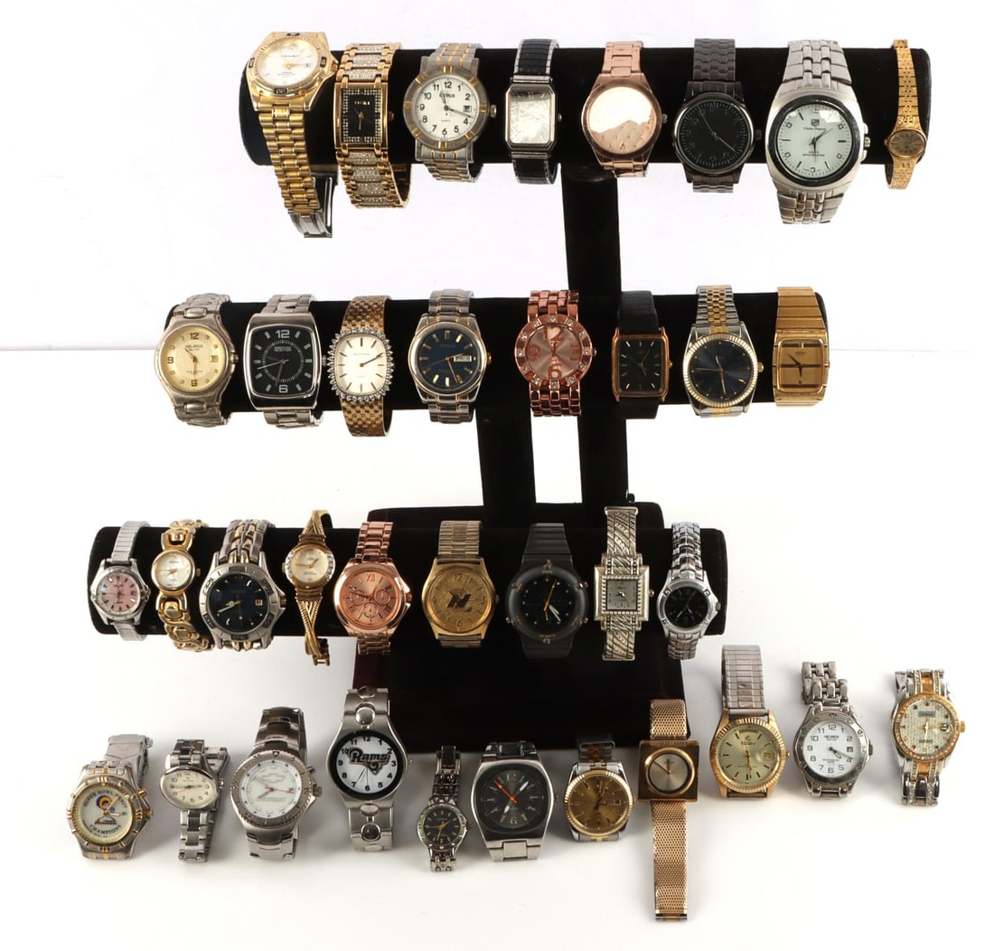 ASSORTED VINTAGE WRIST WATCHES AND WATCH PARTS: Lot contains: Timex, Bulova, Seiko, Cartier, Charles Dumont, Anne Klein and many more. Some in working condition. Some may only need batteries while other may serve as parts replacement. Over 35 watch