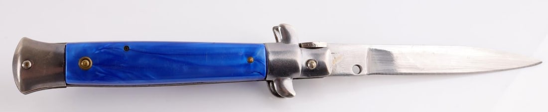 ROSTFREI AUTOMATIC SWITCHBLADE KNIFE: Steel blade. Measures 8 3/4 inches. Very good condition.