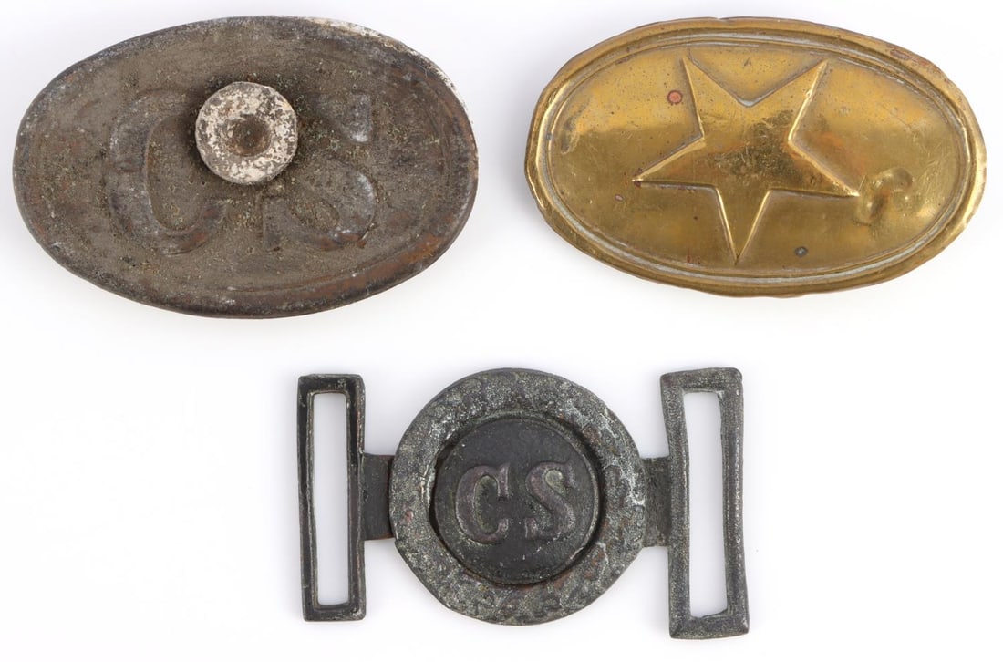 3 CIVIL WAR CONFEDERATE STATES BELT BUCKLES LOT: Lot of three (3) Civil War Confederate States belt buckles including a CS three prong buckle that has a musket bullet lodged in the center and was ground dug from Shiloh, Tennesee. A two piece Confede
