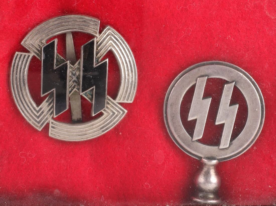 WWII GERMAN SS SPORTS MEDAL & FLAG FINIAL: Badge is unmarked, Finial is a table banner reverse stamped RZM 5, well crafted very convincing, unauthenticated sold as is.