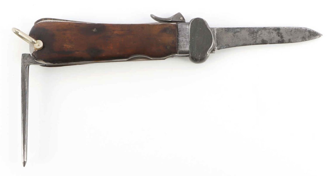 WWII GERMAN THIRD REICH PARATROOPER GRAVITY KNIFE: Steel blade with wood grip plates and push lever on the side. Functions as intended. Blade has been filed. Measures 9 3/4 inches. Unauthenticated, sold as is.
