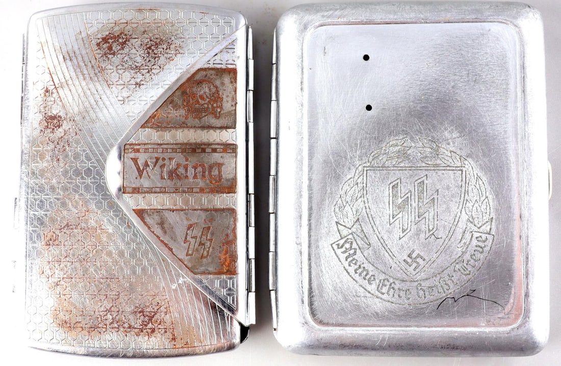 WWII GERMAN SS WIKING AND MOTTO CIGARETTE HOLDERS: Aluminum and steel holders. Good condition with some oxidation on the steel container. Measure 4 X 2 3/4 inches.