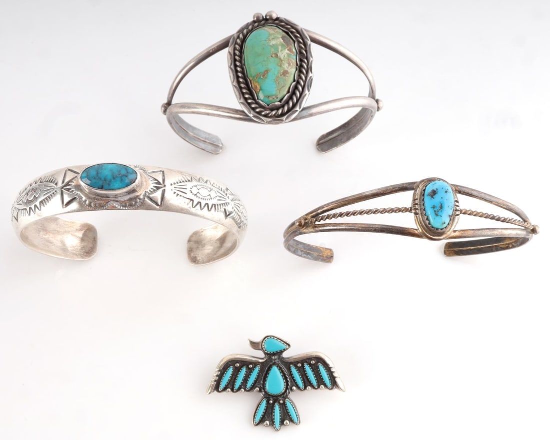 NATIVE AMERICAN STERLING SOUTHWEST JEWELRY LOT: Three cuff bracelets are adjustable. All stamped sterling. One stamped "P", one stamped "BM". Bolo tie slide is stamped sterling and signed on the reverse. Total weight 54.1 grams. This lot has a rese