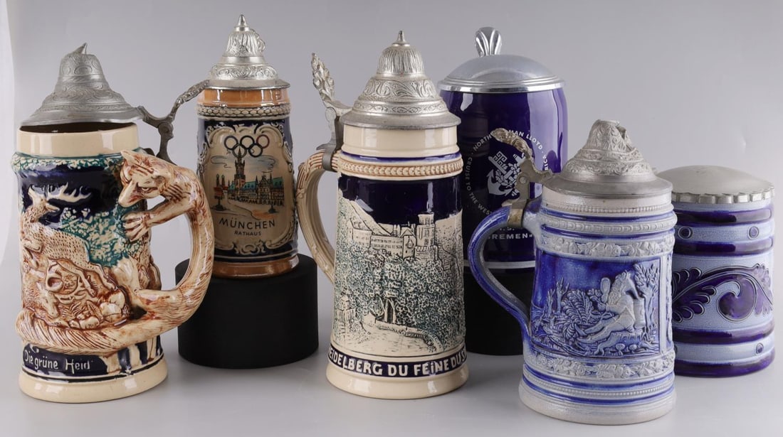 6 VINTAGE GERMAN BEER STEIN WITH PEWTER LID LOT: Lot of six(6) Vintage German Beer Steins with pewter lids. Sizes range between a pint and liter. One stein for the Munchen Olympics, one for a North German Lloyd Cruise and four more! Good condition.