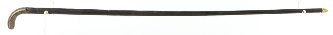 WEAPON GRADE STACKED LEATHER WALKING CANE STICK: Has stacked leather discs tat are covered, gold inlay heavy metal grip, flexes, and good brass ferrule tip. Measures 30 inches.