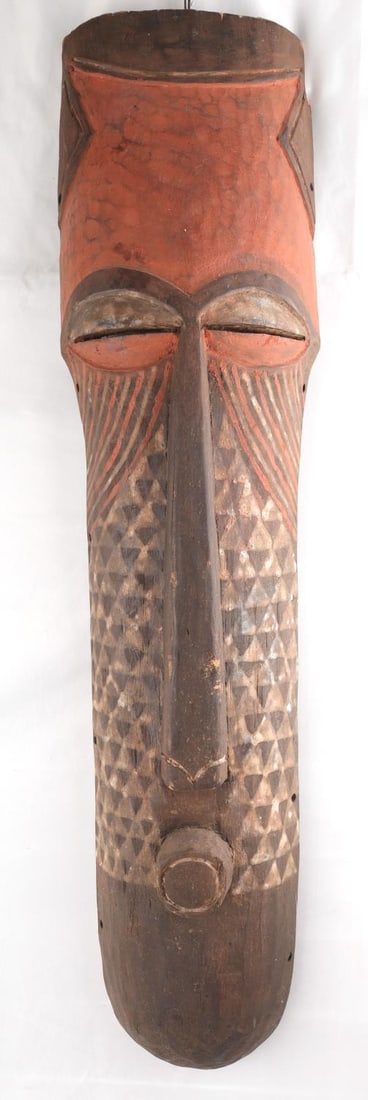 AFRICAN CONGO EMANGUNGU PLANK WOOD MASK: Circa early 20th century. Polychrome plank mask , central Africa, Democratic Republic of Congo, possible Bembe people. Length 37 inches.