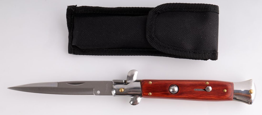 STILETTO SWITCH BLADE ASSISTED KNIFE: Stiletto make. 440 stainless steel. Very good condition. It measures 9 1/2 inches.