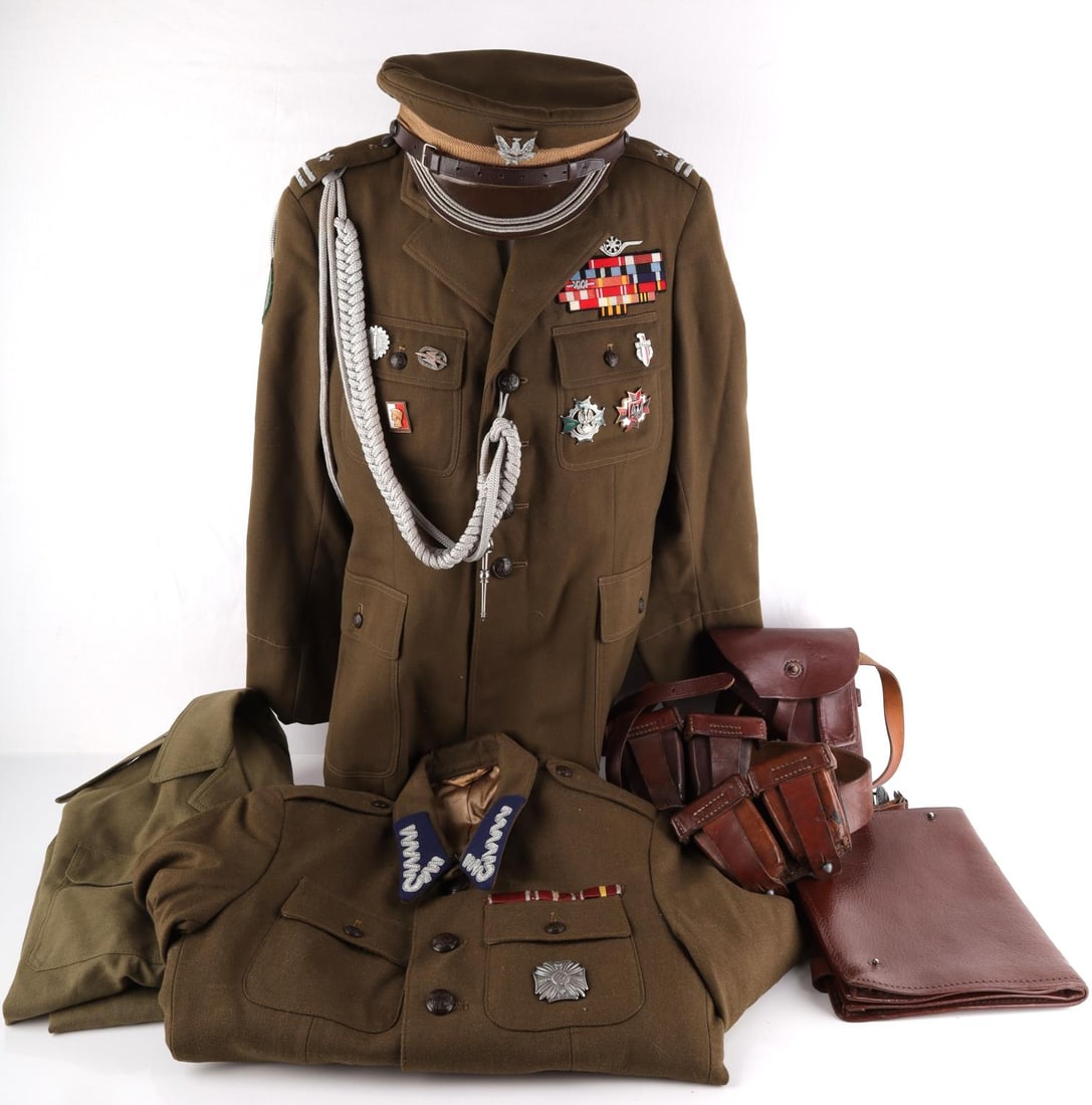 COLD WAR ERA POLISH ARMY TANKER OFFICER'S UNIFORM: Cold War Era Polish Army Tanker Officer's Uniform Lot. Lot includes two jackets(one officer), a visor cap, a combat blouse, a leather belt with ammo pouches, a leather belt and pistol holster, and las