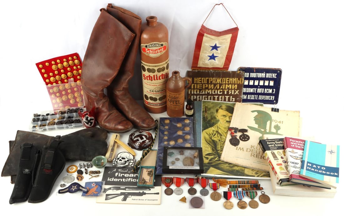 WWI WWII CIVIL WAR THIRD REICH VIETNAM MILITARIA: Includes WWI Cavalry boots about a size 8, Hansen gauntlet gloves, buttons, civil war metal detecting finds, military books and manuals, Third Reich art books, patches, medals, Japanese Red Cross meda