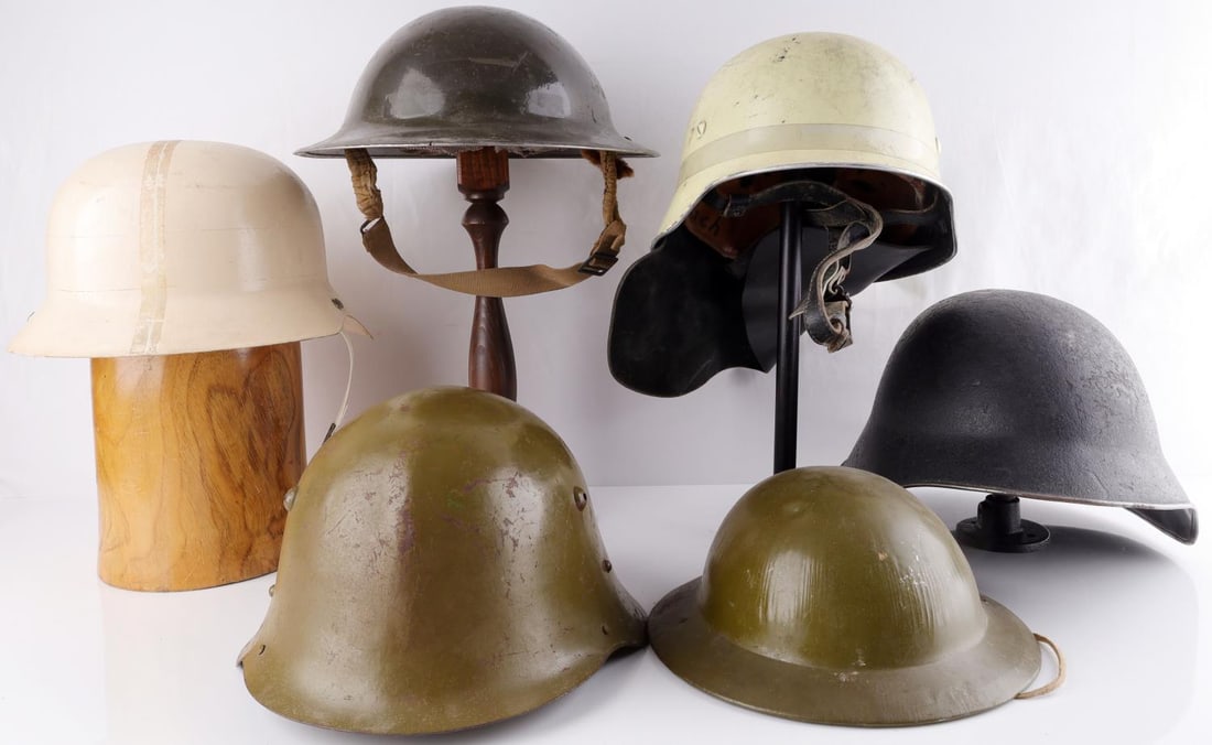 LOT OF 6 HELMETS BRITISH BULGARIAN GERMAN FIRE: Lot of SIX (6). Includes real and toy Brodie helmet, Bulgarian, East German, 2 German fire police, all very good.