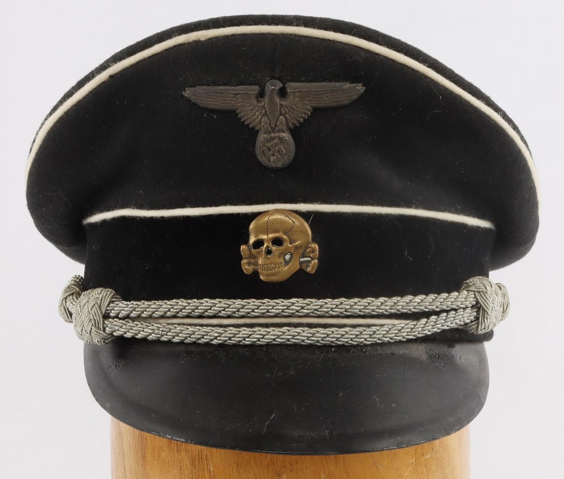 WWII GERMAN SS OFFICER VISOR SIZE 57 EURO: Very high quality and very convincing, thread fluoresces inside and piping fluoresces, machine sewn sweatband, hand-sewn liner, wearable size 57 Euro. Based on reasons aforementioned. Unauthenticated 