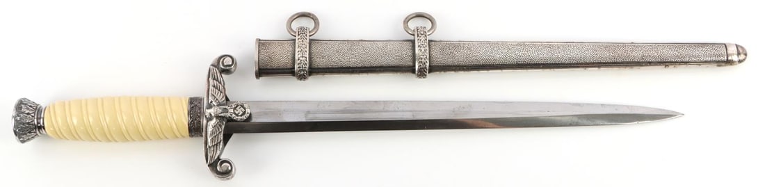 WWII GERMAN REICH HEER ALCOSO OFFICER DAGGER: Blade in good condition with some very light wear throughout, "Alcoso Solingen" maker's mark on lower blade. Thin tang. Celluloid grip, nickel crossguard and pommel in good condition. Unauthenticated,