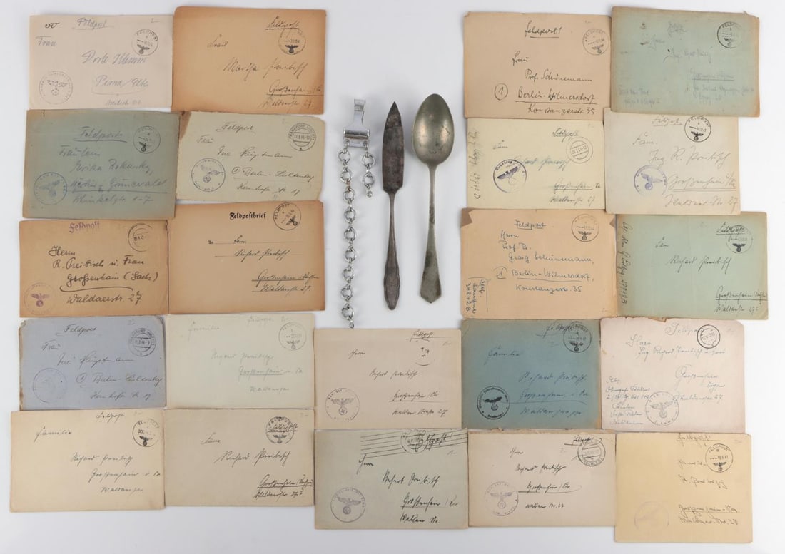 WWII GERMAN FELDPOST SS HEER SPOON & DAGGER HANGER: Includes 23 Feldpost covers all Reichsadler stamped, SS stamped spoon, Regimental stamped HEER butter knife, and dagger hanger, Ges. Gesch stamped, all very good original condition.