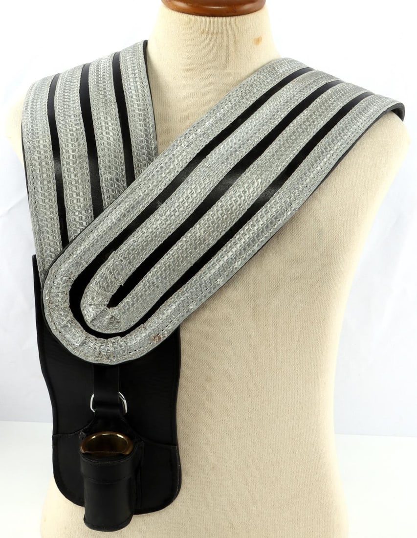 WWII GERMAN FLAG BANNER BEARER SHOULDER HARNESS: WWII German flag and banner bearer harness. Silver and black leather. Dimension: 49 X 5 inches and in very good condition. Unauthenticated and sold as is.