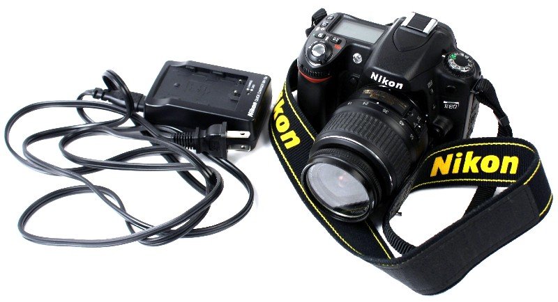 NIKON D80 SLR CAMERA: Nikon D80 with Nikon DX Nikkor 18-55mm lens. New battery and charger.