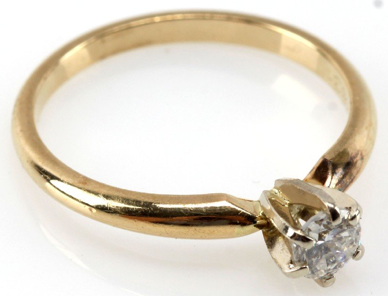 LADIES SOLITAIRE DIAMOND RING: One ladies solitaire engagement ring mounting, six prong white gold head containing one round brilliant cut diamond weighing approximately .33cts, clarity graded I1-I2, color graded I-J, with fair mak