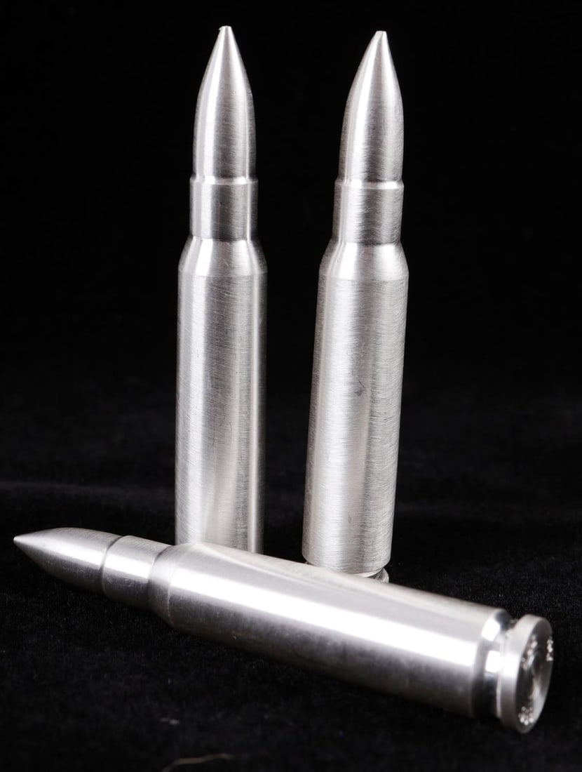 SILVER BULLET BULLION ROUND LOT OF 3 WIN .308 CAL: Lot of three 2 oz. Silver Bullets (.308 Caliber) modeled after the distinguished .308 Winchester rifle ammunition. Each contain .999 fine silver. This lot has a reserve.