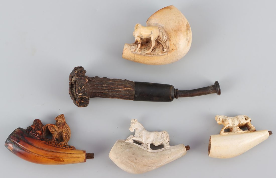 19TH CENTURY HORSE FIGURINE MEERSCHAUM PIPES LOT: Lot of five(5) 19th Century to 20th Century Meerschuam pipes including three horse figurine pipes, one bear figurine, and one stag/antler cigarette holder. Head missing on one horse on double horse pi