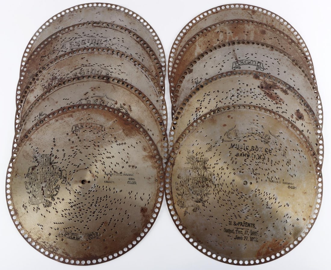 LOT OF 10 REGINA MUSIC BOX DISC: Measure 12 inches. Song include Dragon Fly Waltz, Strike Up the Sand, The Walkure, The Last Rose of Summer, Mamma's Little Runaway, Marching to War, and more. Very good condition. All playable. This l