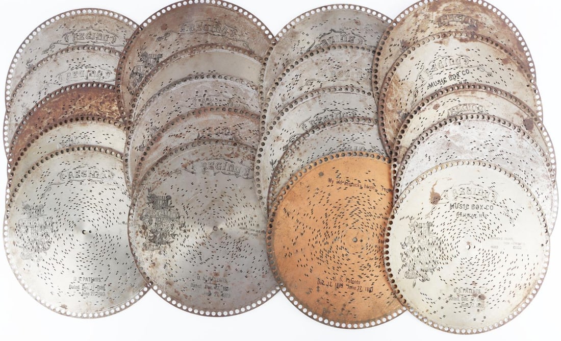 LOT OF 20 REGINA MUSIC BOX DISC: Measure 12 inches. Very good condition and playable. Some songs include Monte Carlo March, Huntsmen's Chorus, Phantom's Dance, the Barcarolle, and more.