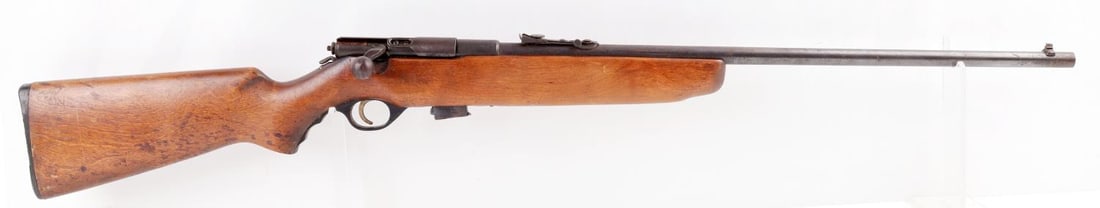 WARDS WESTERN FIELD .22 S-L-LR BOLT ACTION RIFLE: Ward's Western Field, .22 S-L-LR, bolt action rifle with one magazine. Top of the barrel reads, "Ward's Western Field", "04M 497A", and "22 S-L-LR". Rifle features a fixed bladed front sight and rear