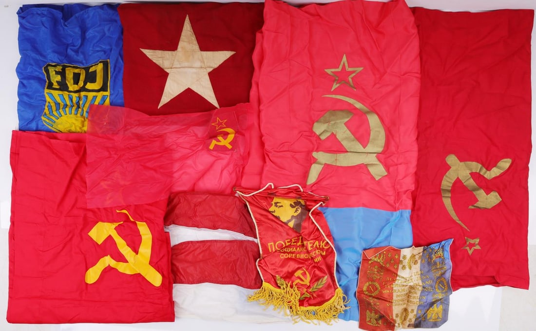 5 USSR SOVIET FLAG LOT PLUS OTHERS: The larger Soviet flags measure 65 X 29 (dated 1989), 65 X 29 (dated 1989), 10 X 16, 72 X 35 (dated 1970), plus others. As photographed.