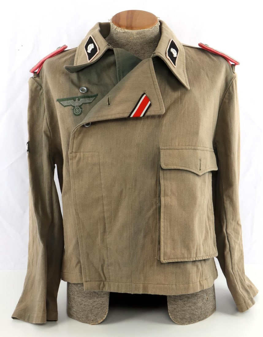 WWII THIRD REICH GERMAN PANZER FIELD TUNIC: Herringbone twill tunic with collar tabs. shoulderboards, Iron Cross ribbon, and Army eagle patch. Tank destruction badge on right sleeve. Tunic is large sized but no size markings. Very good conditio