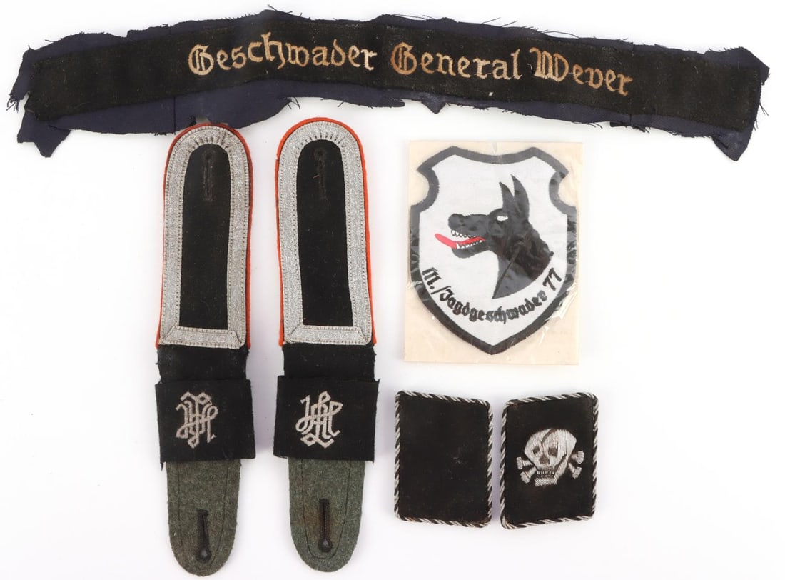 WWII GERMAN THIRD REICH LOT OF 6 PATCHES & BADGES: Lot of 6 WWII German patches and badges. 2 Waffen SS Panzer Division Lebstandarte SS Adolf Hitler Shoulder boards with clip cypher. 1 Luftwaffe Geschwader Wever Cuff Title. 2 Collar tabs 1 with SS Tok